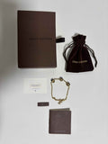 Bracelet Louis Vuitton – Métal doré & Dés strassés – 19 cm