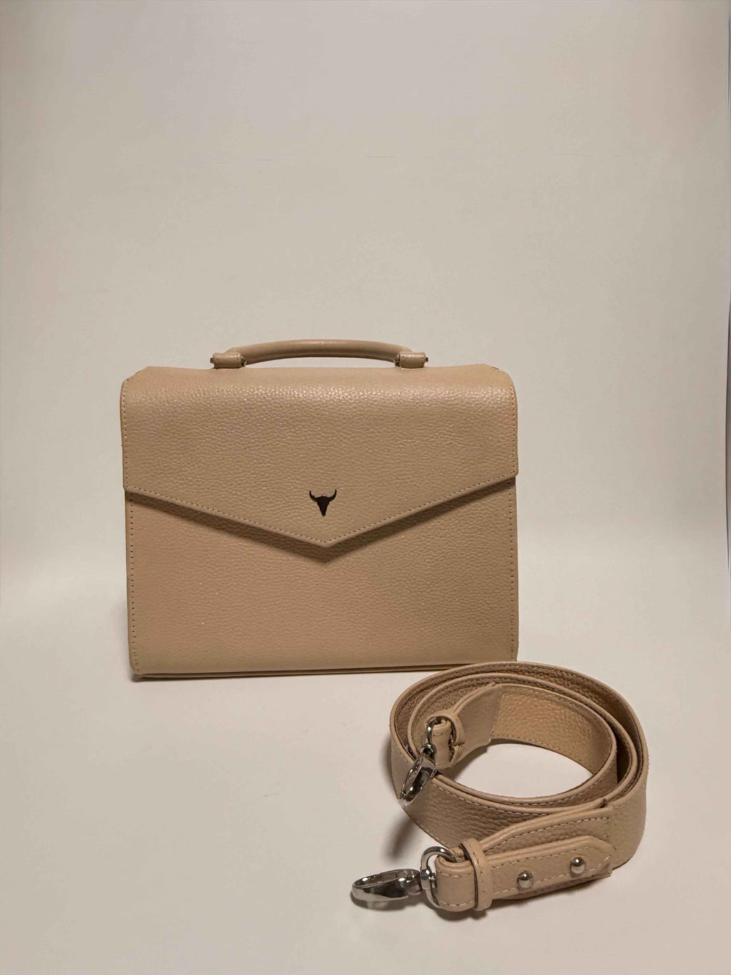 Sac en cuir beige subtilement pailleté
