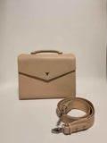 Sac en cuir beige subtilement pailleté