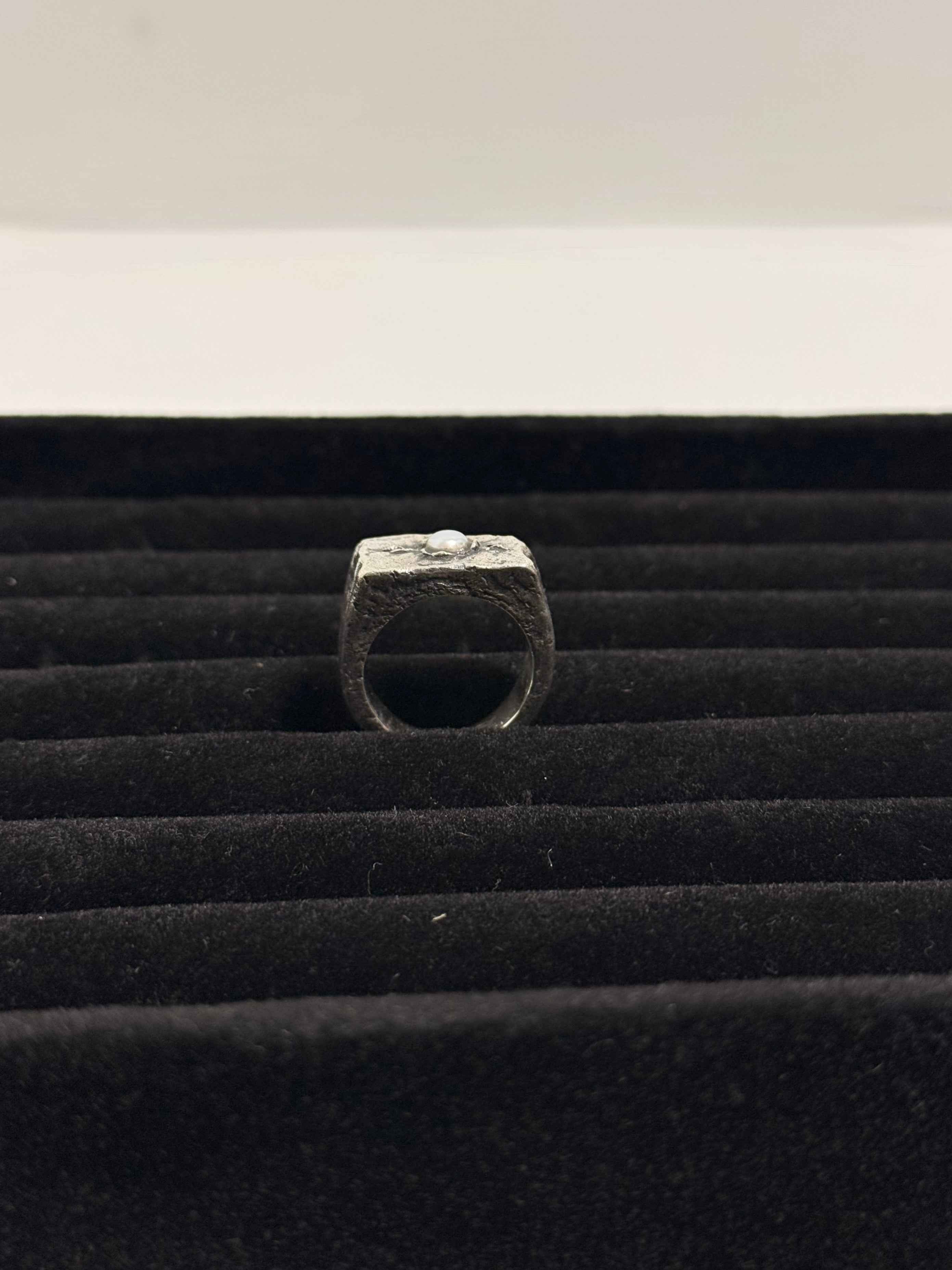 Bague en argent massif 925 ornée d'une perle