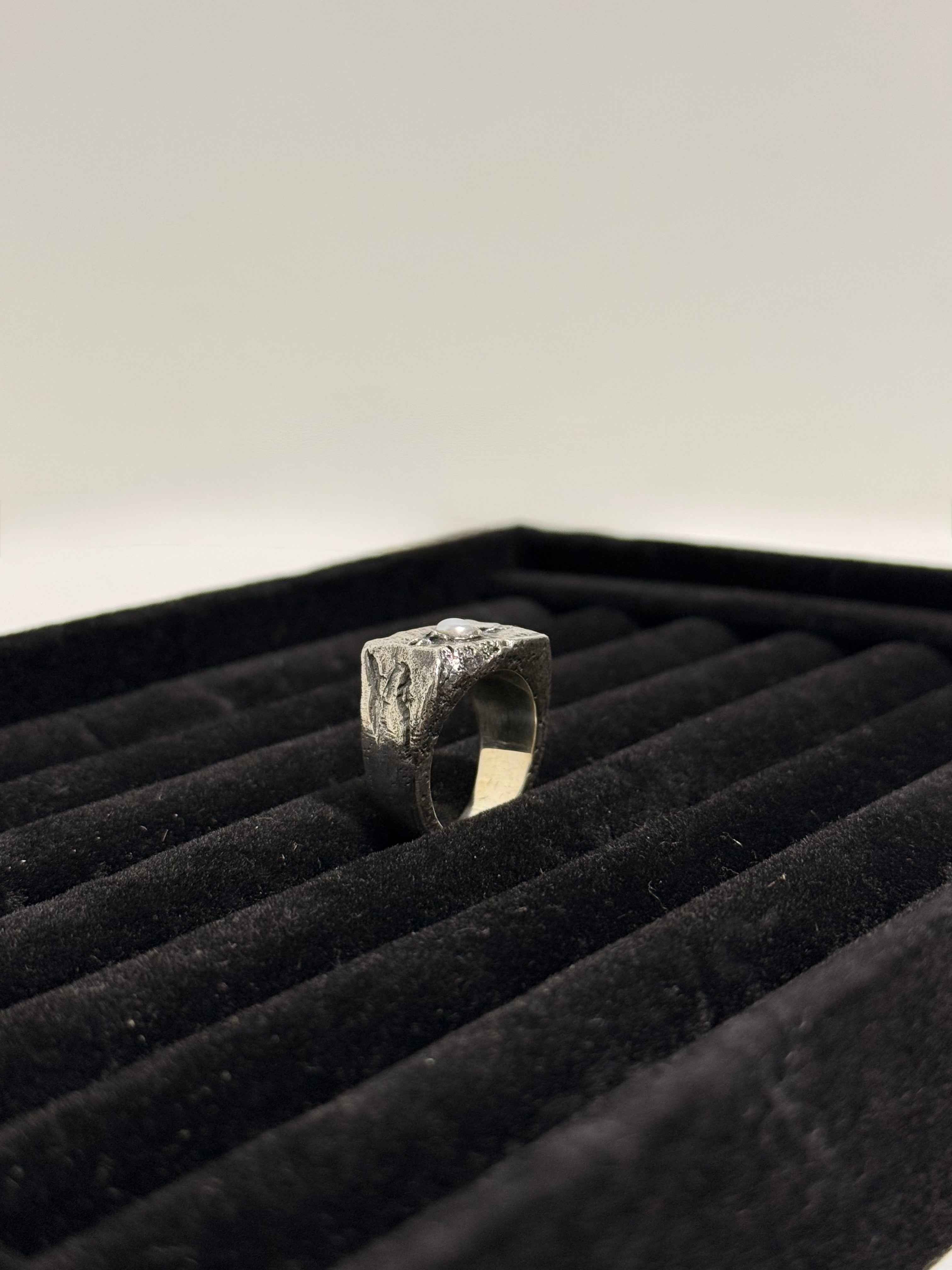 Bague en argent massif 925 ornée d'une perle