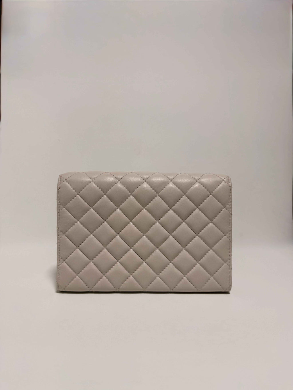 Pochette en cuir matelassé beige