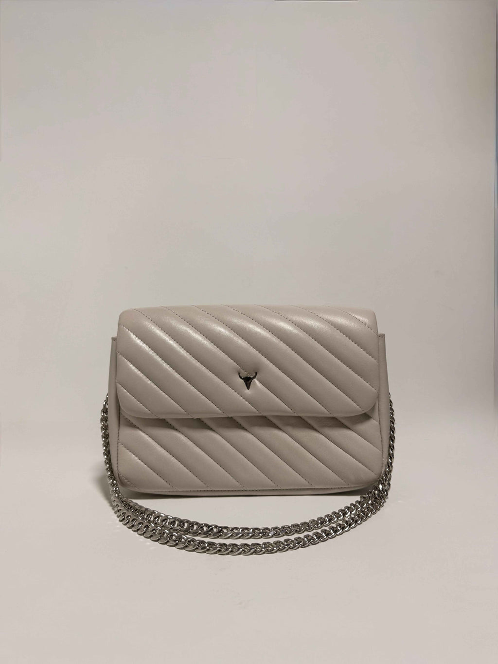 Petit sac bandoulière matelassé beige en cuir